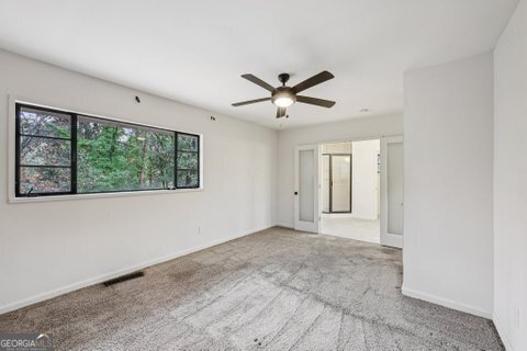 2562 Farley Street East Point, GA 30344 - Photo 16 of 30 a view of an empty room with a window