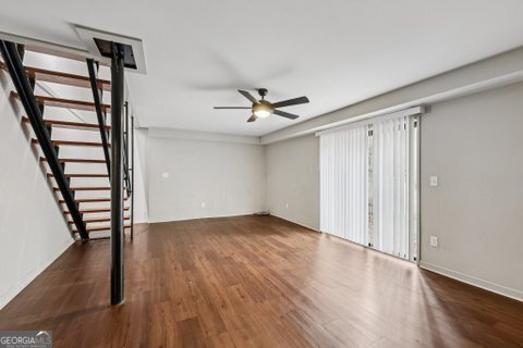 2562 Farley Street East Point, GA 30344 - Photo 20 of 30 wooden floor in an empty room with a window