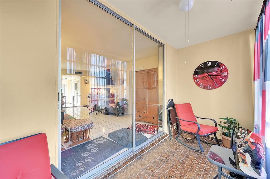 2811 North Pine Island Road, Unit 111 Sunrise, FL 33322 - Photo 12 of 13 a living room with furniture