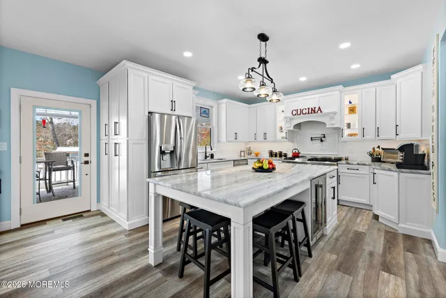 a bed room with a bed and a lamp