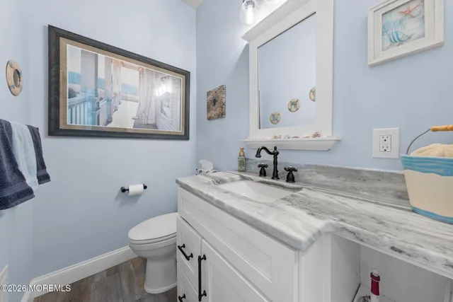 a outdoor living space with furniture and a floor to ceiling window