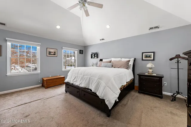 a view of a house with a yard and front view of a house