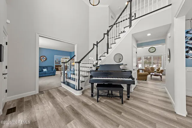 a kitchen with stainless steel appliances granite countertop a stove and a sink