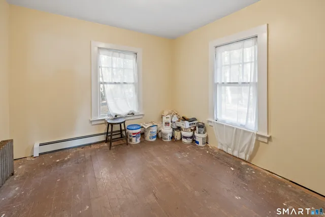 an empty room with windows