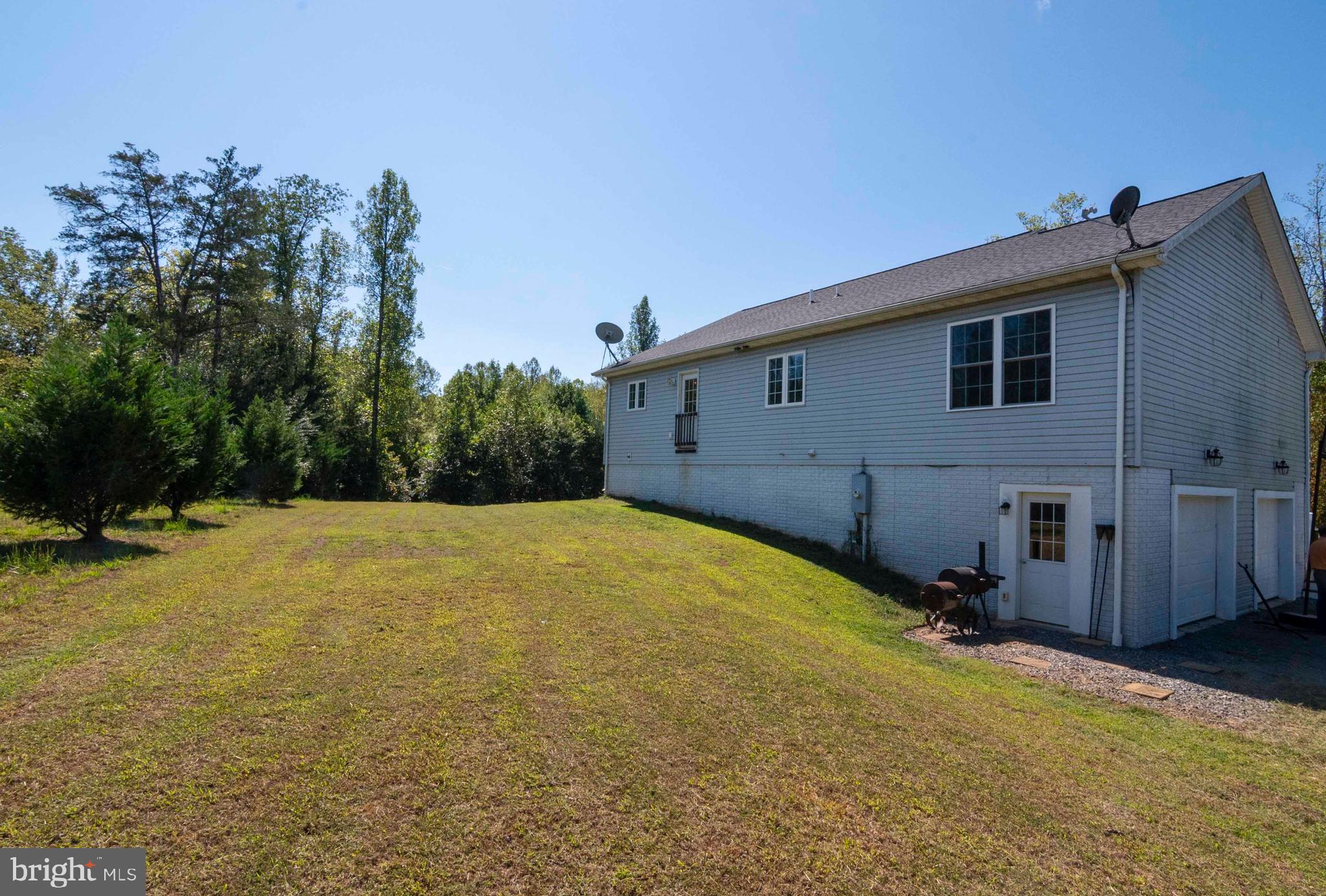 21281 Old Mill Road Culpeper, VA 22701 - Photo 11 of 40 a house view with a backyard space