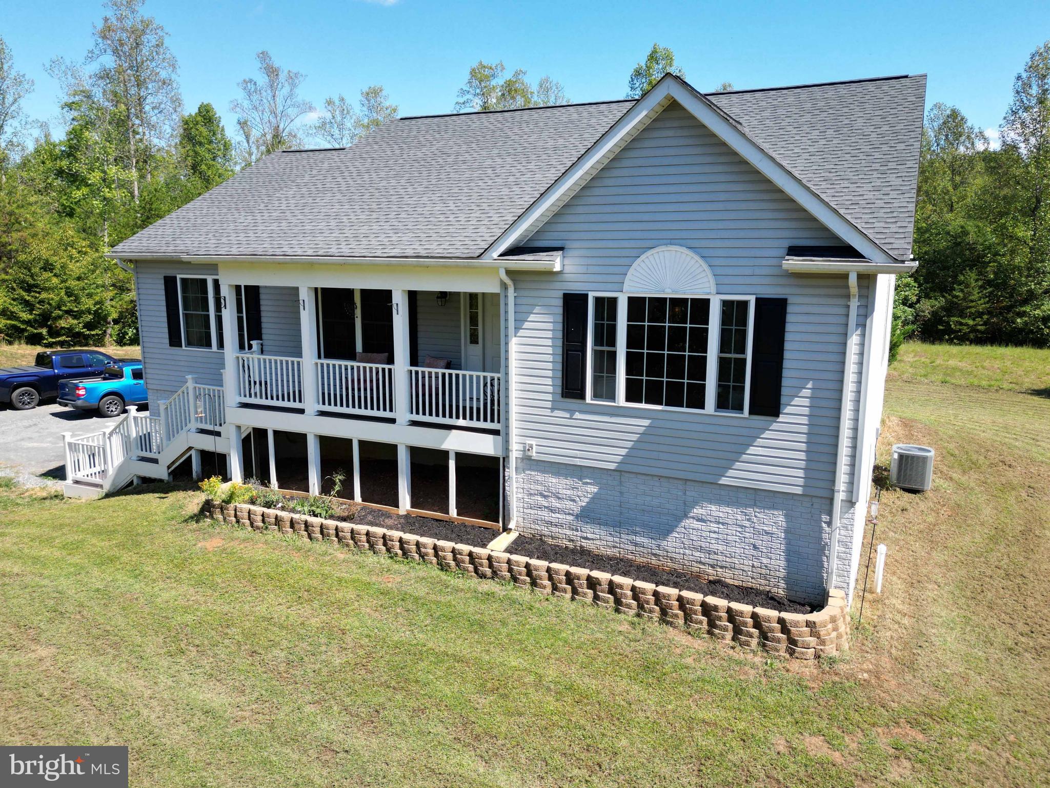 21281 Old Mill Road Culpeper, VA 22701 - Photo 19 of 40 a view of a house with wooden floor and a yard