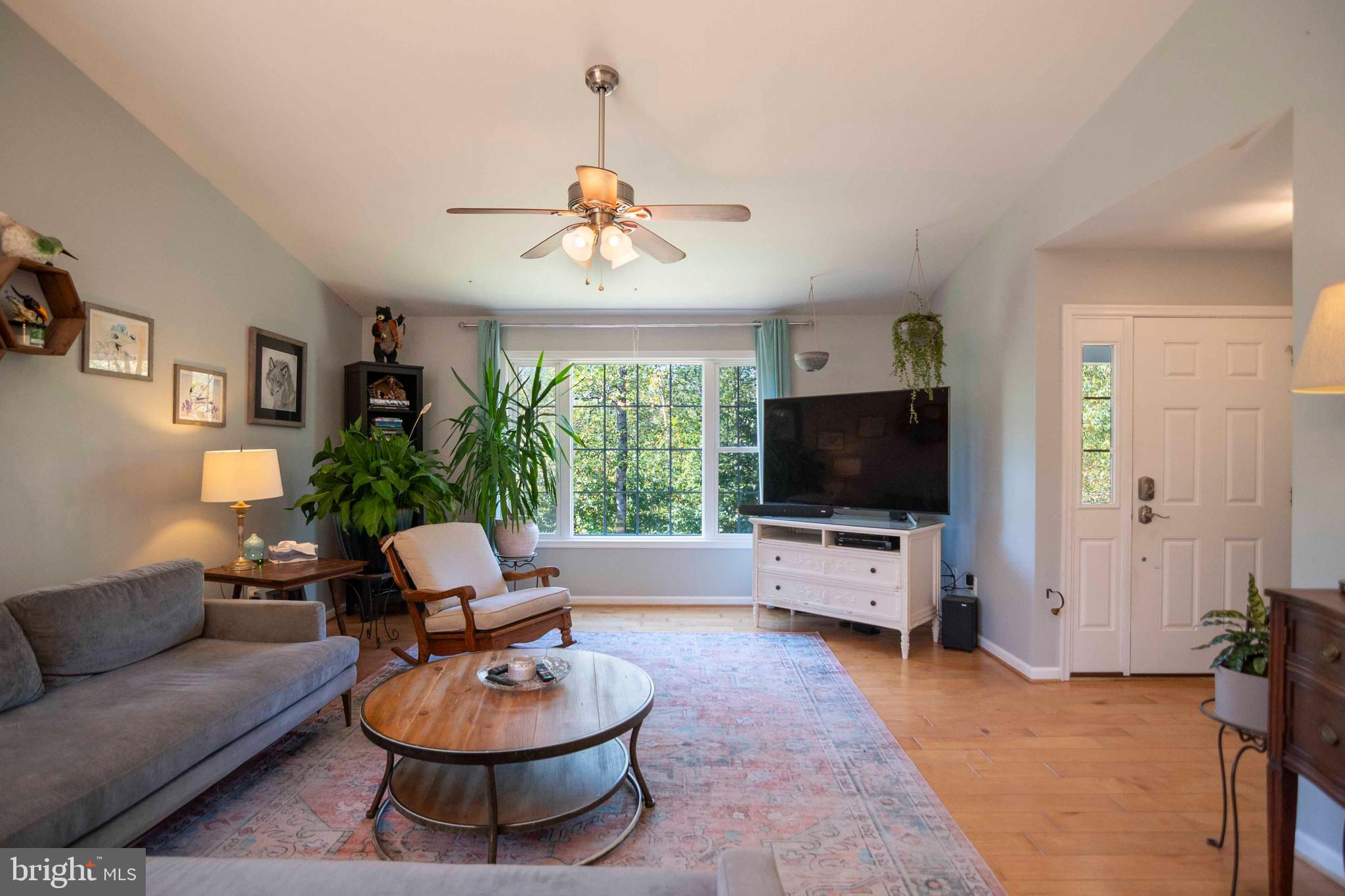 21281 Old Mill Road Culpeper, VA 22701 - Photo 23 of 40 a living room with furniture and a flat screen tv