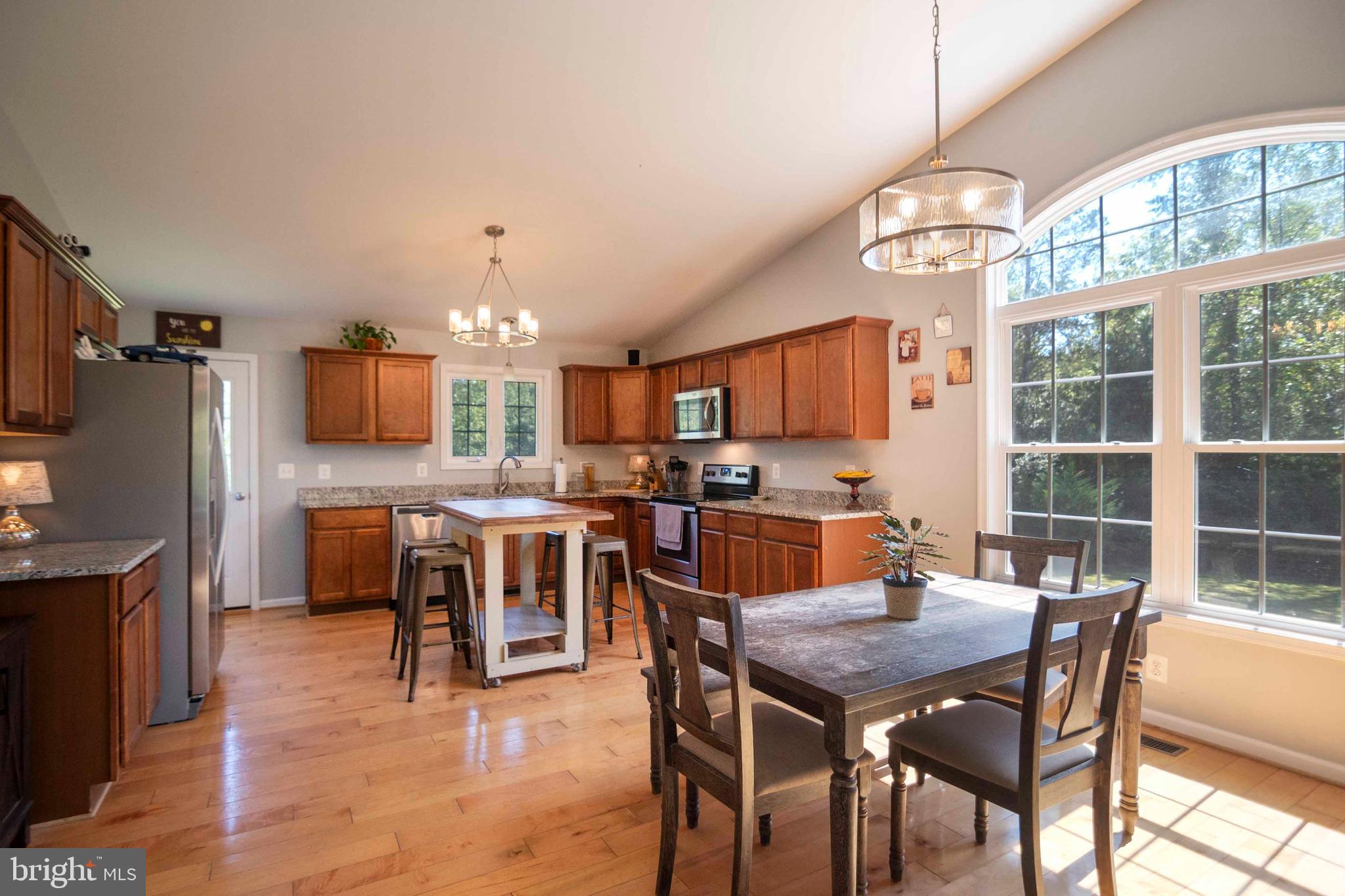 21281 Old Mill Road Culpeper, VA 22701 - Photo 24 of 40 a view of a dining room with furniture window and wooden floor
