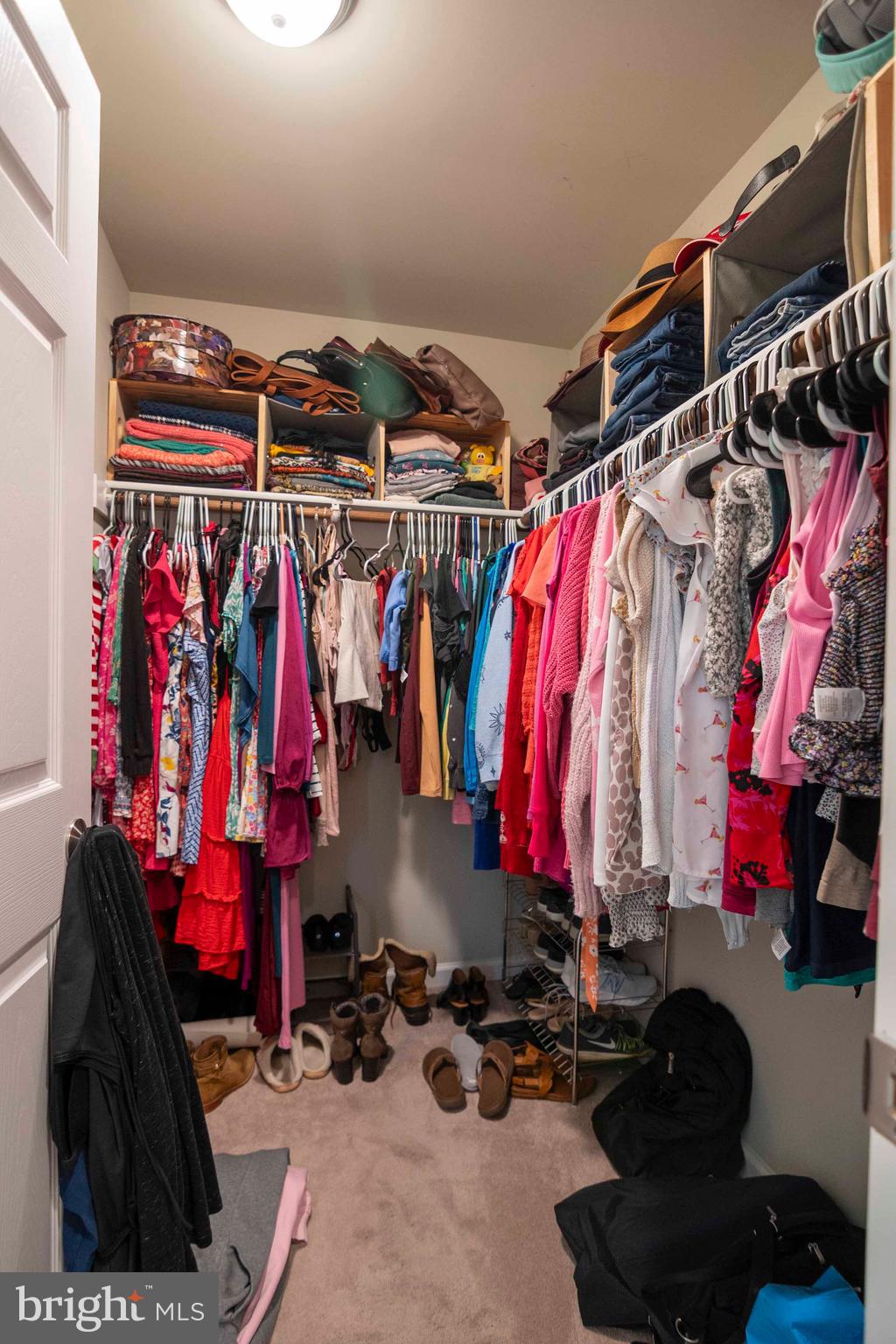 21281 Old Mill Road Culpeper, VA 22701 - Photo 33 of 40 a view of walk in closet with clothes