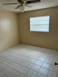 a view of a room with a dishwasher and a stove top oven