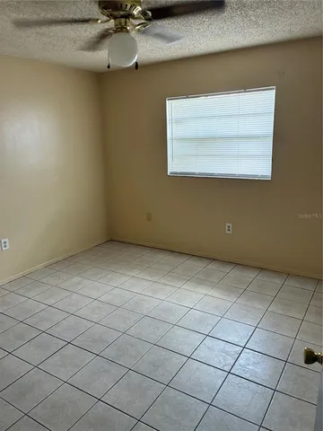 a view of a room with a dishwasher and a stove top oven