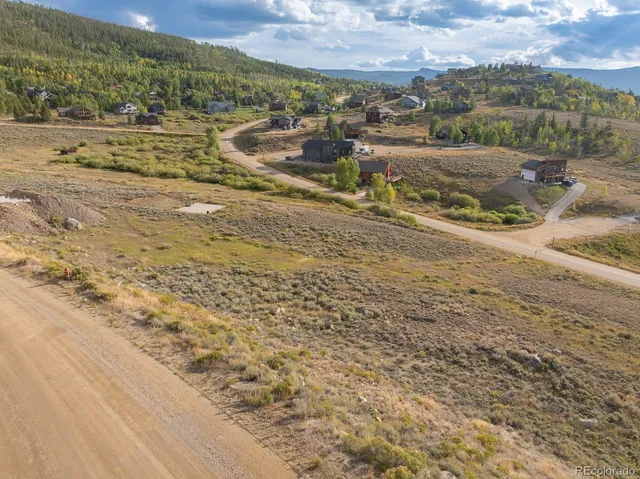 a view of a road with an ocean view