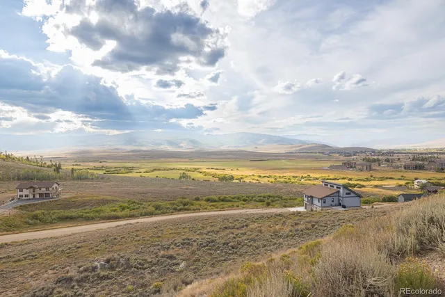 a view of a city with ocean view