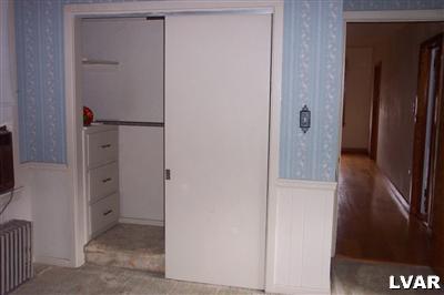 1371 Ackermanville Road Bangor, PA 18013 - Photo 18 of 29 Built in drawers in Master BR closet, looking from BR down the hall.