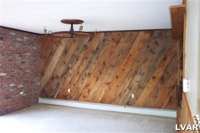 1371 Ackermanville Road Bangor, PA 18013 - Photo 6 of 29 1st floor family rm addition with wet bar, overlooks the inground pool, real wood planks