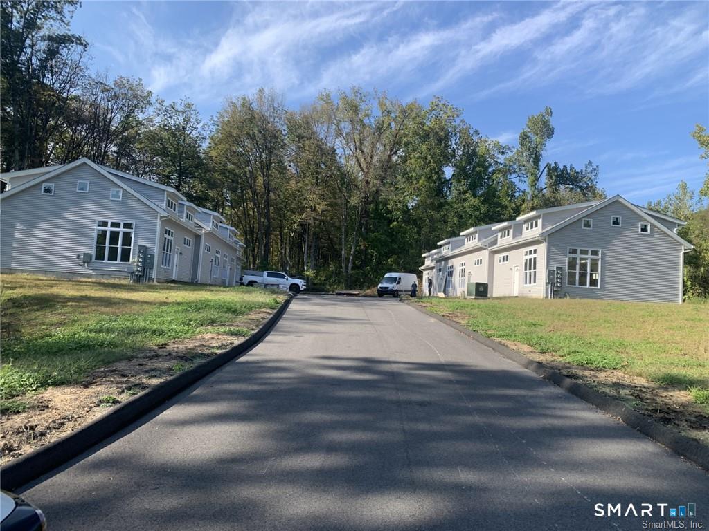 64 Boardman Road New Milford, CT 06776 - Photo 2 of 8 a view of a house with a yard