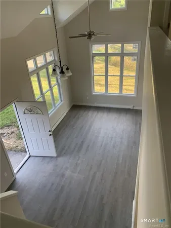 a view of an empty room with a window