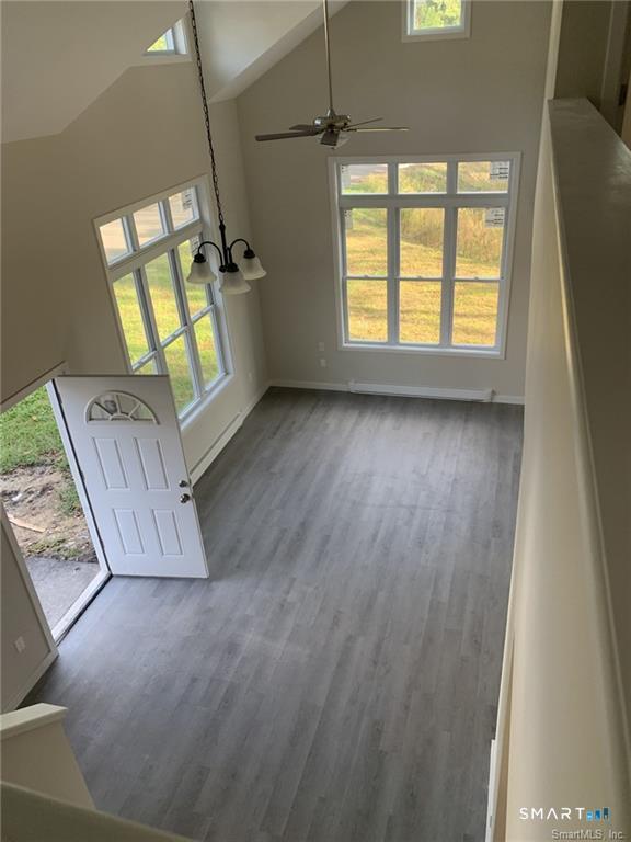 64 Boardman Road New Milford, CT 06776 - Photo 4 of 8 a view of an empty room with a window