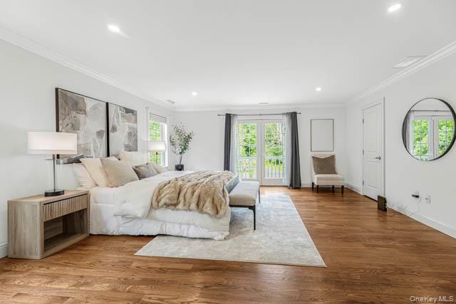 1 Kewanee Road New Rochelle, NY 10804 - Photo 25 of 36 a spacious bedroom with a large bed and a window