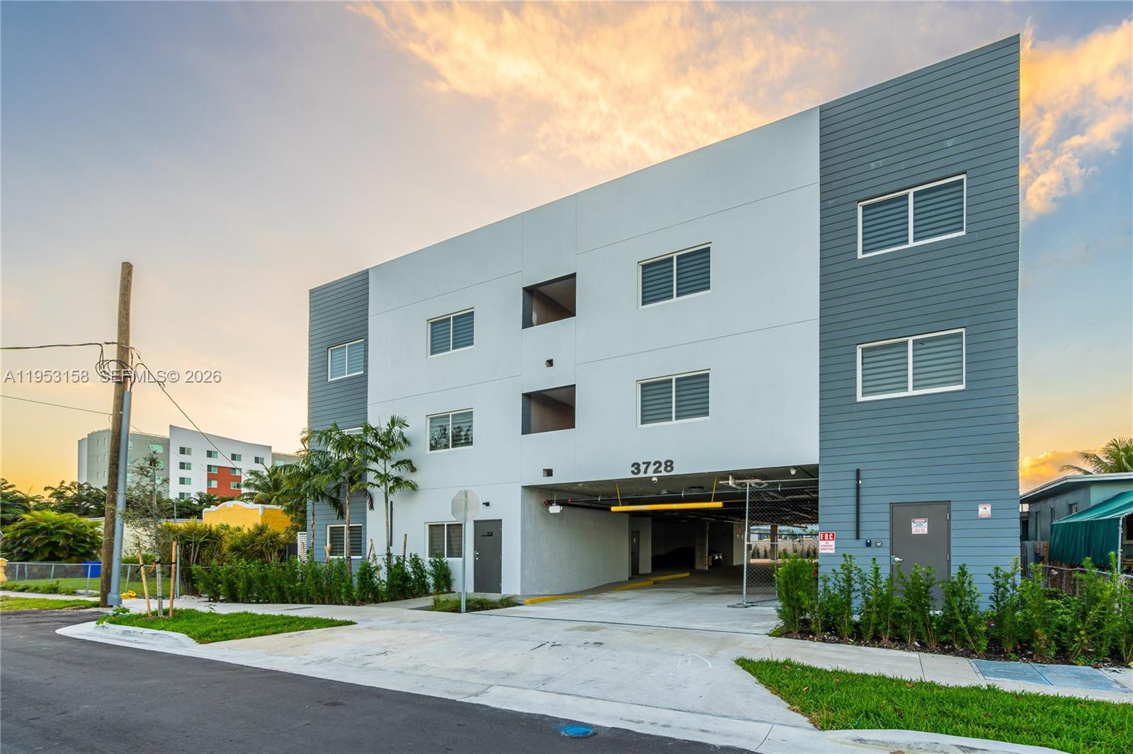 3728 Northwest 19th Avenue, Unit 304 Miami, FL 33142 - Photo 26 of 26 a view of building with yard