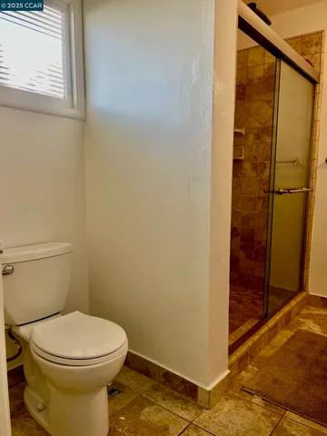 a view of a blue door and a window