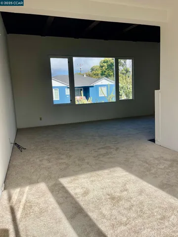 a view of a living room washer and dryer
