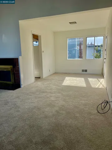 a view of a living room washer and dryer