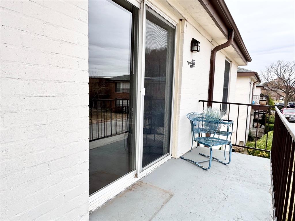 4014 Ridglea Country Club Drive, Unit 407 Fort Worth, TX 76126 - Photo 23 of 26 a view of an outdoor space with seating area