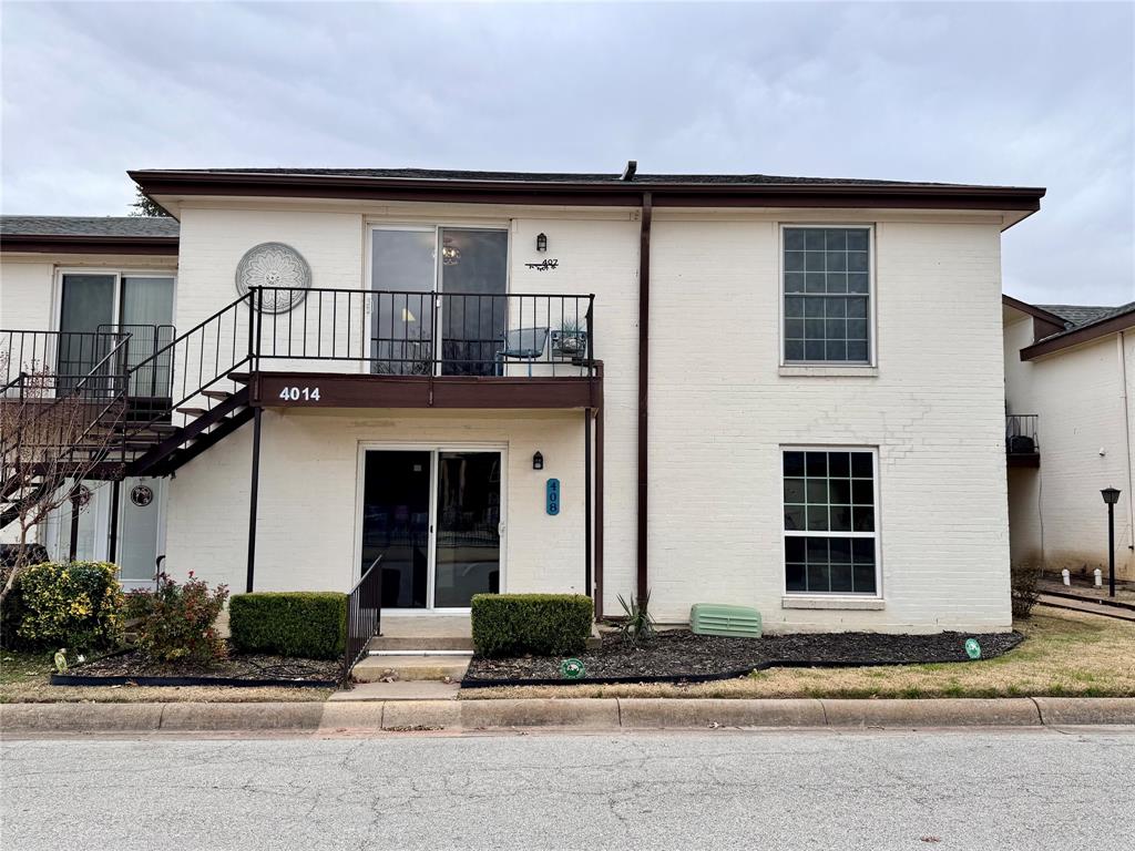 4014 Ridglea Country Club Drive, Unit 407 Fort Worth, TX 76126 - Photo 24 of 26 a front view of a house