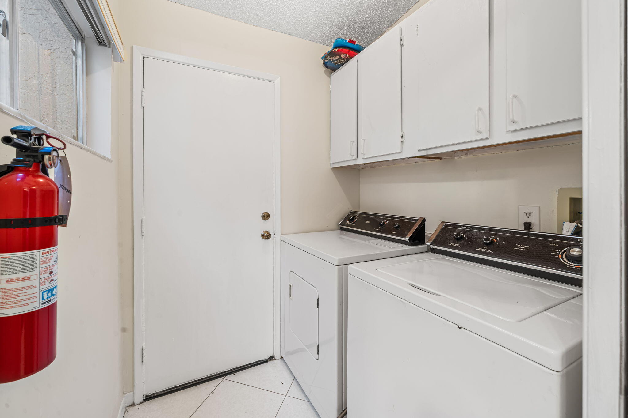 8030 Springside Court, Unit D Boca Raton, FL 33496 - Photo 18 of 39 Inside Laundry Room