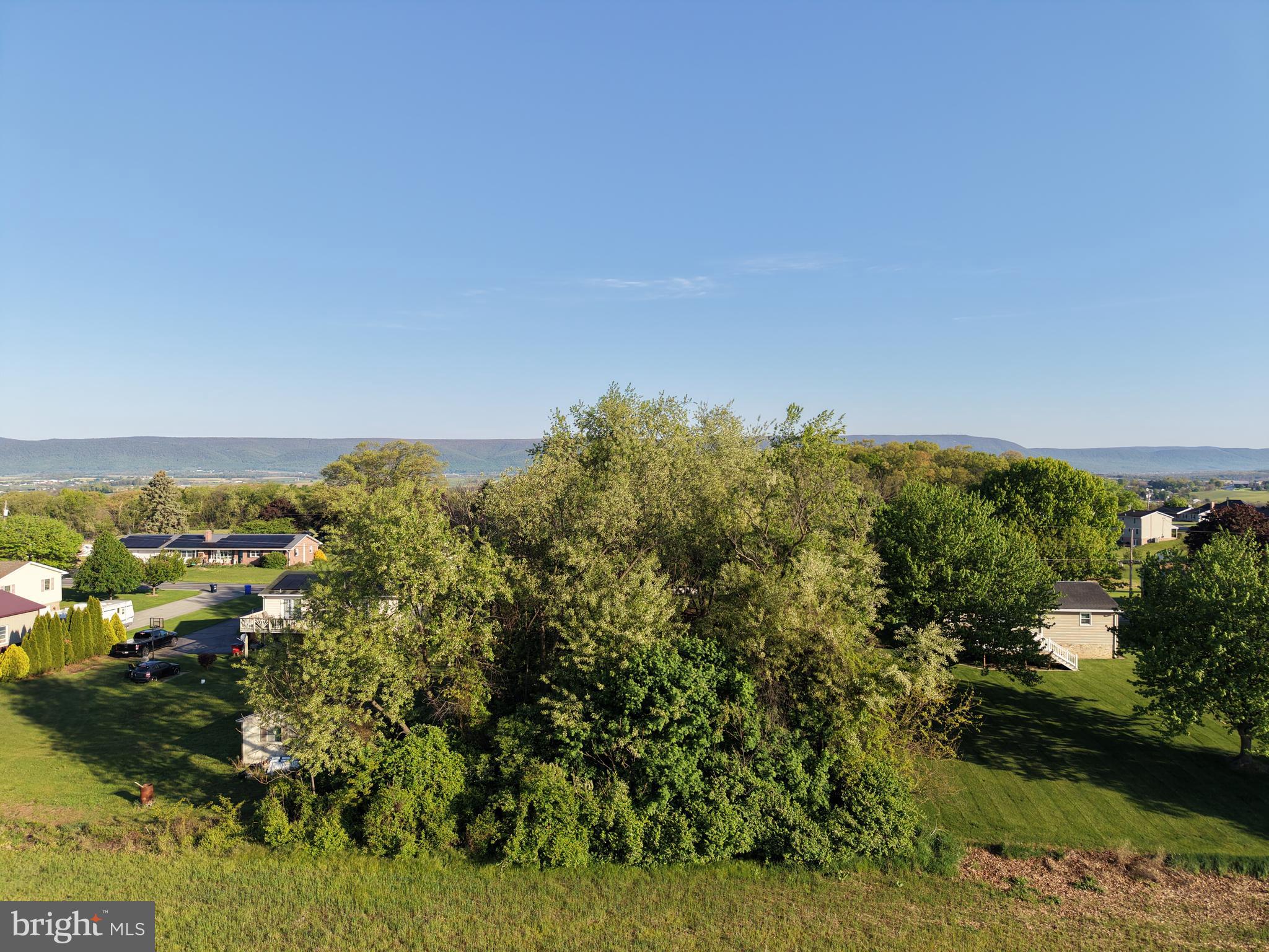 1290 Brechbill Road Chambersburg, PA 17202 - Photo 6 of 17 a view of a lake with houses
