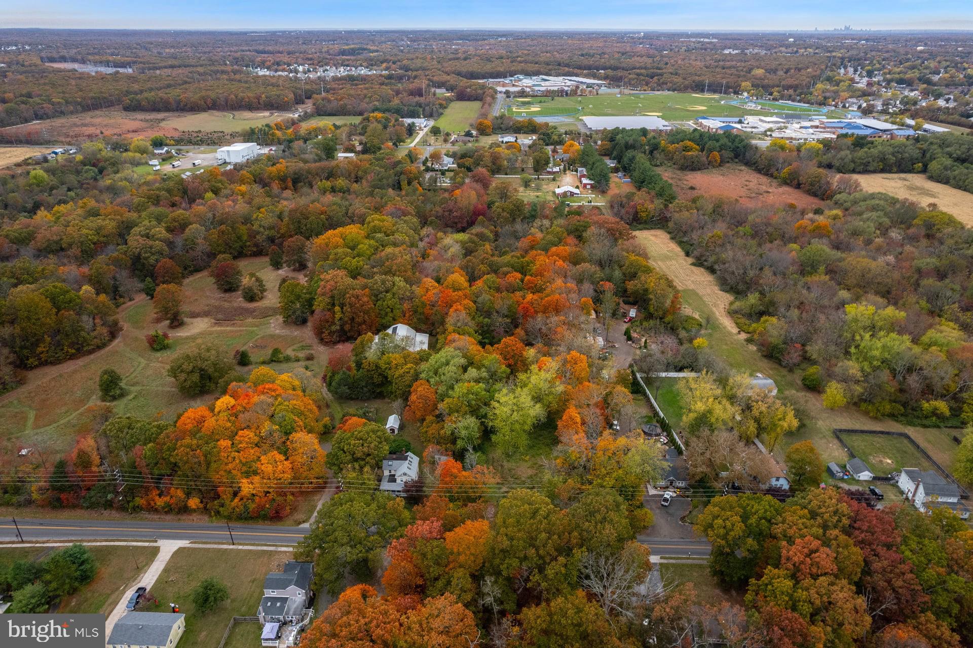 647 Chestnut Street Williamstown, NJ 08094 - Photo 3 of 9 an aerial view of residential houses with outdoor space