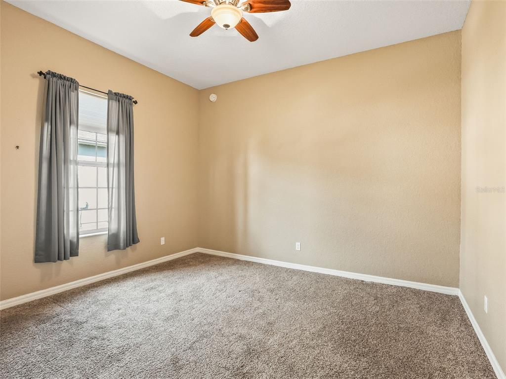 16896 South East 110th Court Road Summerfield, FL 34491 - Photo 41 of 61 an empty room with a empty space and a window