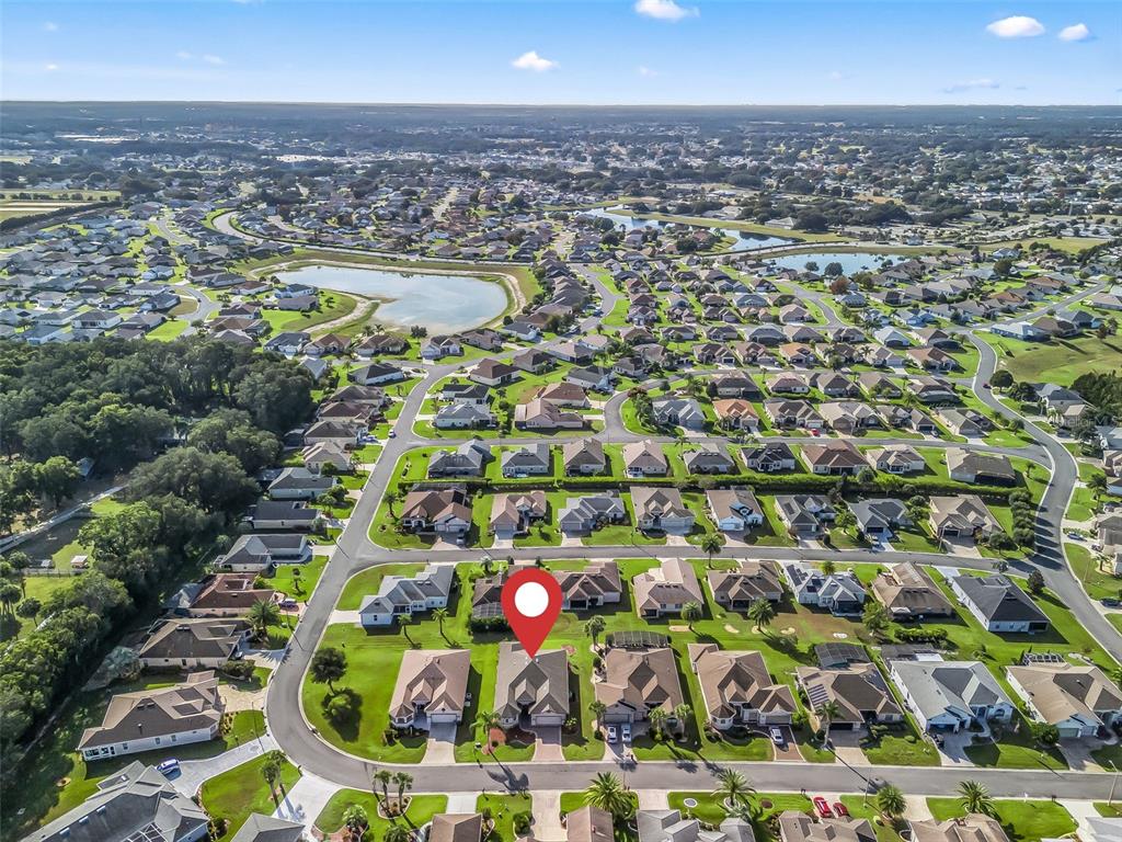 16896 South East 110th Court Road Summerfield, FL 34491 - Photo 50 of 61 an aerial view of residential houses with outdoor space