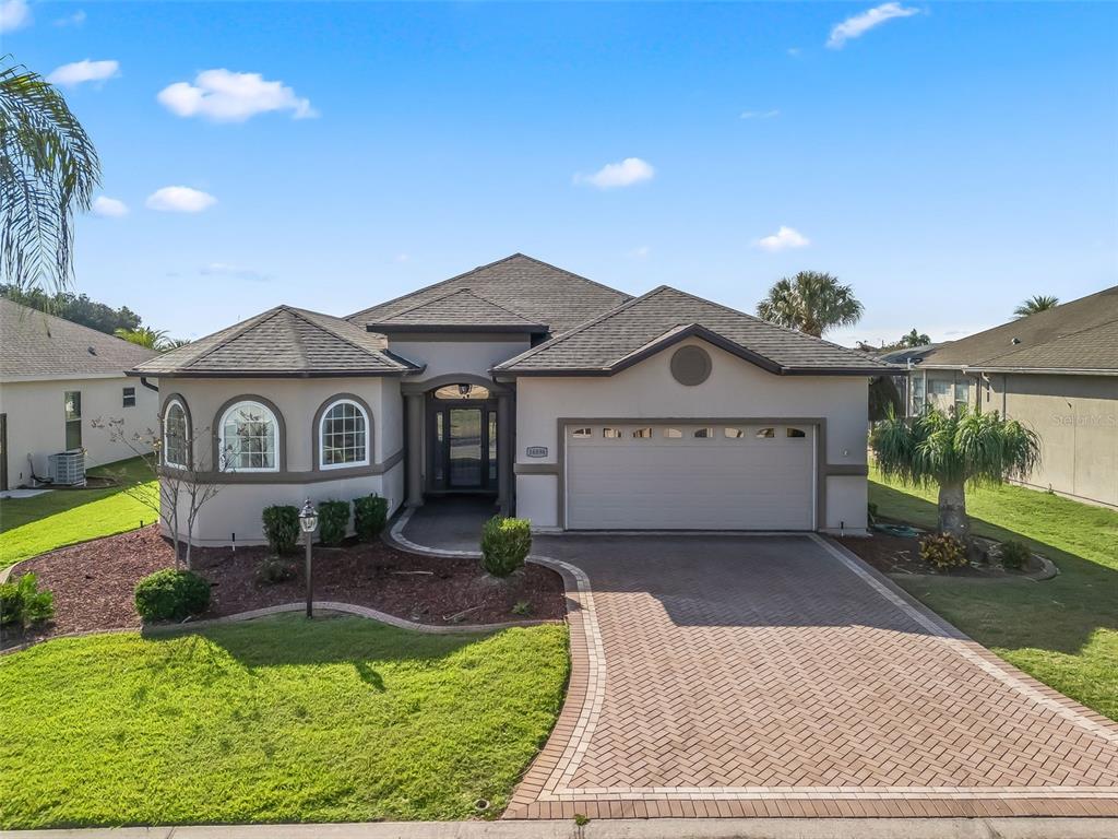 16896 South East 110th Court Road Summerfield, FL 34491 - Photo 51 of 61 a view of a house with a yard
