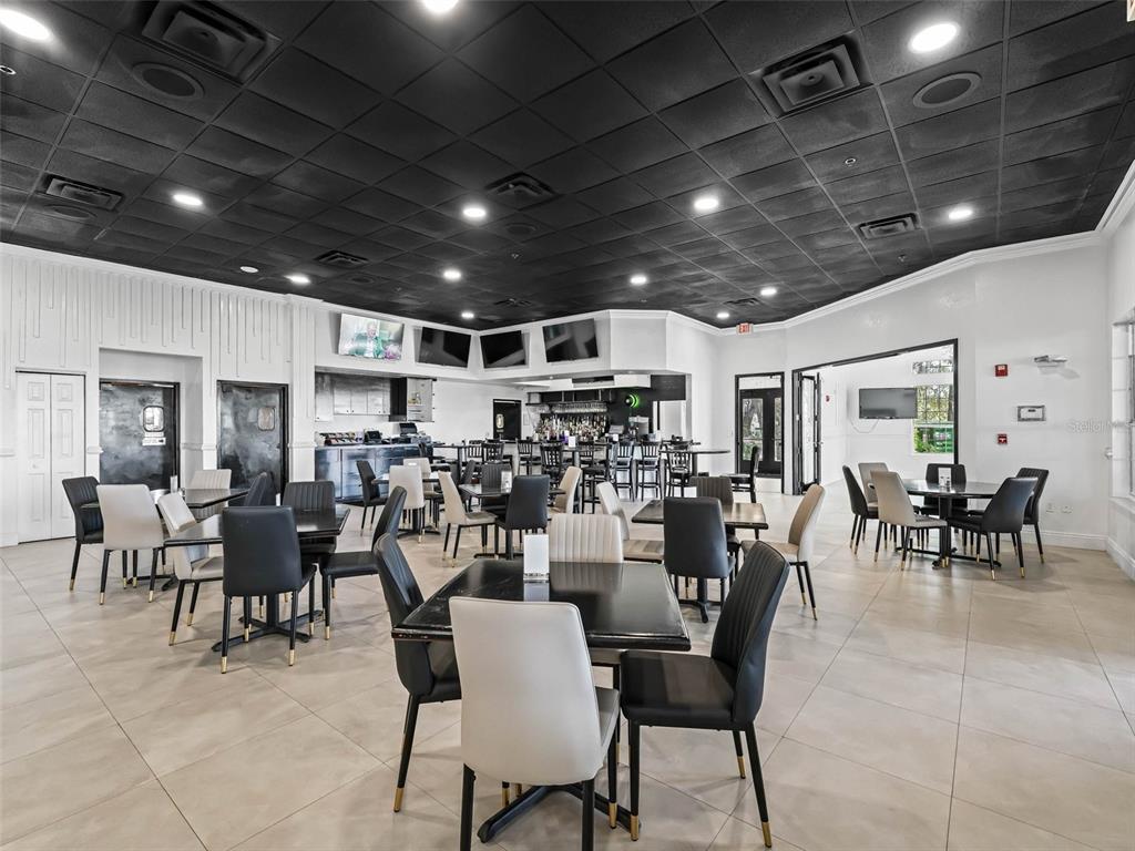 16896 South East 110th Court Road Summerfield, FL 34491 - Photo 54 of 61 a view of a dining room with furniture