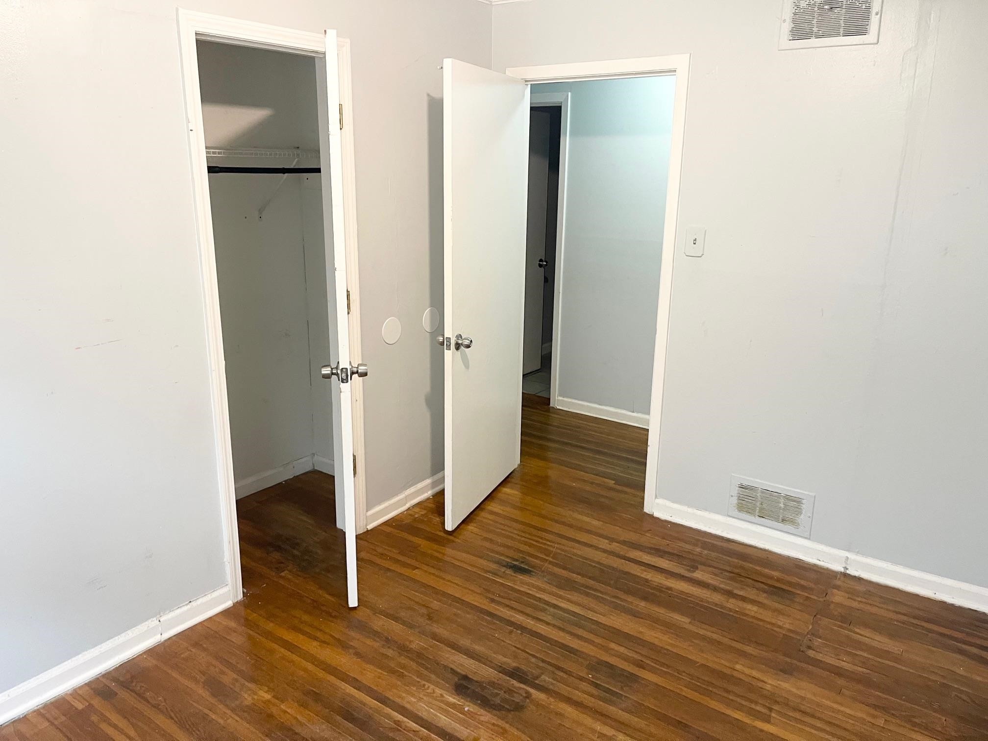 1783 Danville Road Memphis, TN 38117 - Photo 6 of 12 a view of a room with wooden floor and a bathroom