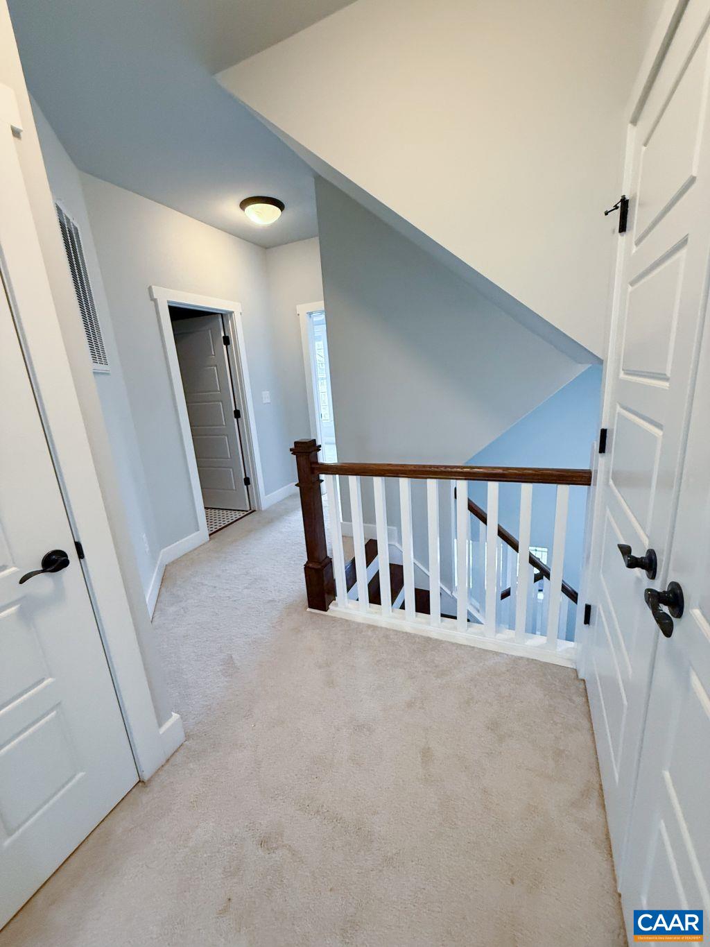 2038 Avinity Loop Charlottesville, VA 22902 - Photo 20 of 36 a view of an empty room with stairs