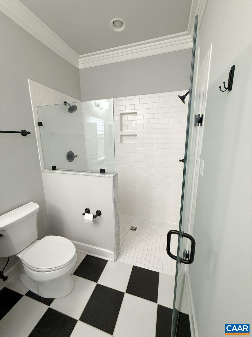 2038 Avinity Loop Charlottesville, VA 22902 - Photo 27 of 36 a bathroom with a toilet and a shower
