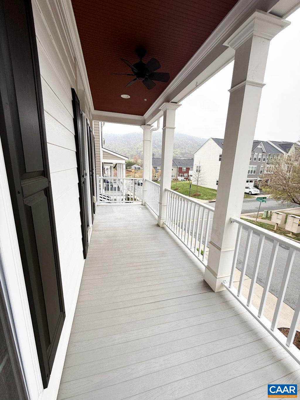 2038 Avinity Loop Charlottesville, VA 22902 - Photo 33 of 36 a view of a porch with wooden floor and stairs