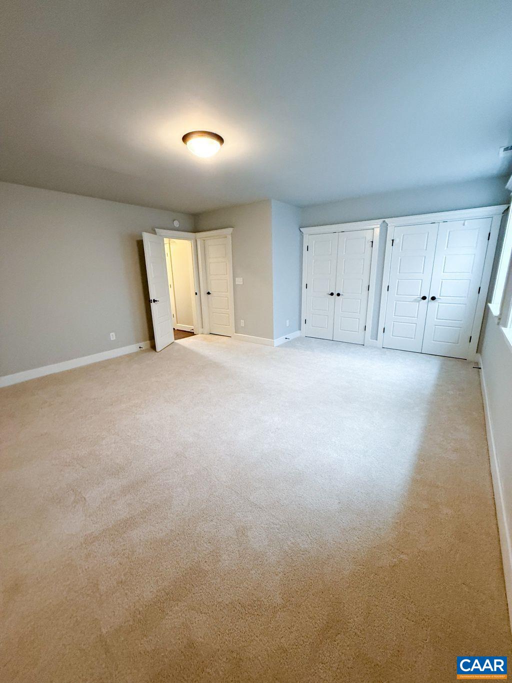 2038 Avinity Loop Charlottesville, VA 22902 - Photo 6 of 36 a view of an empty room with a window