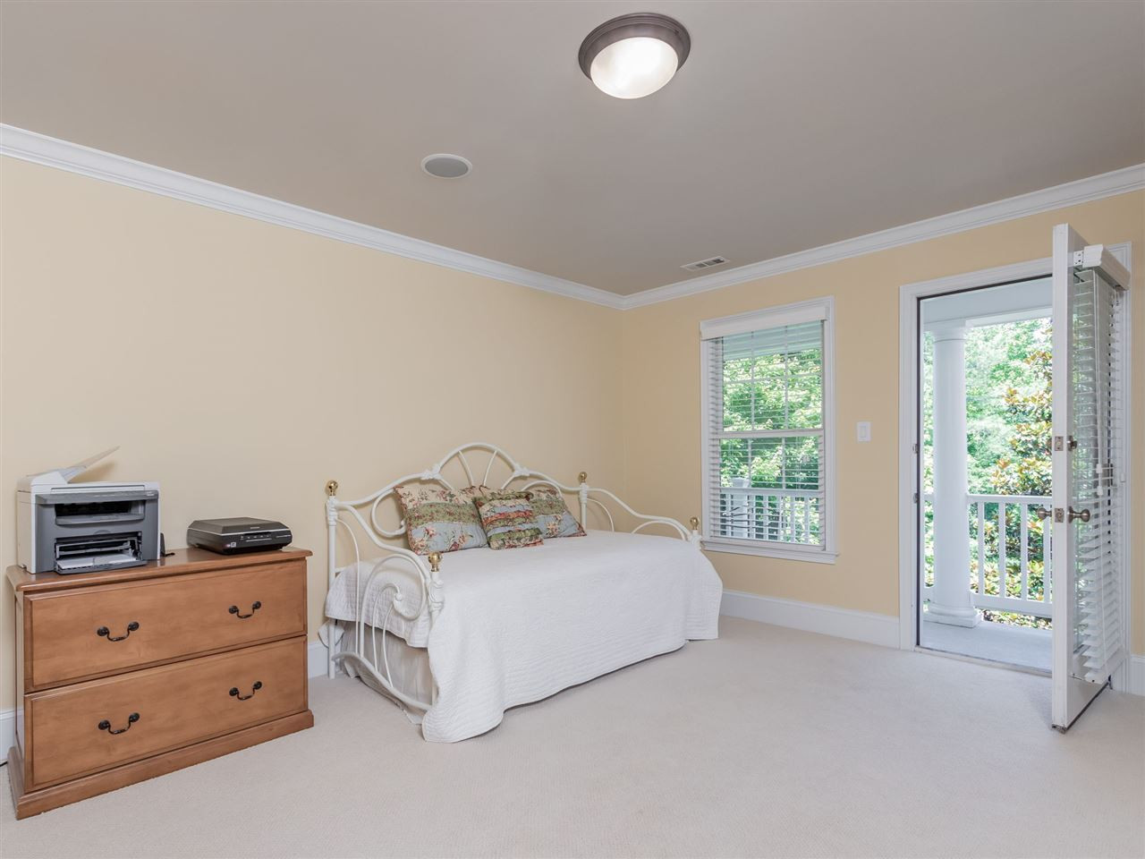 4717 Haleytree Court Raleigh, NC 27606 - Photo 22 of 30 Another spacious second floor bedroom! This one has a balcony! Bedroom