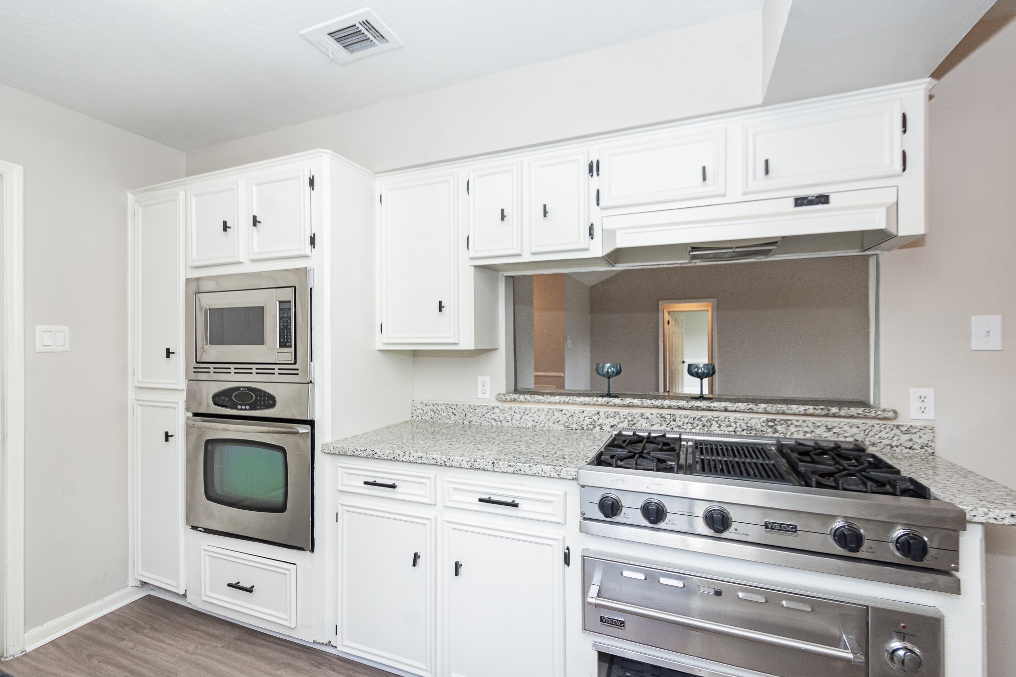 29019 Stapleford Street Spring, TX 77386 - Photo 11 of 27 a white stove top oven sitting inside of a kitchen