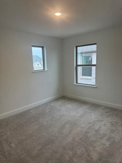 3108 Windecup Road Celina, TX 75009 - Photo 24 of 31 an empty room with a window