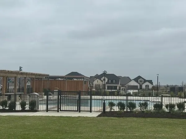 a view of a house with a swimming pool