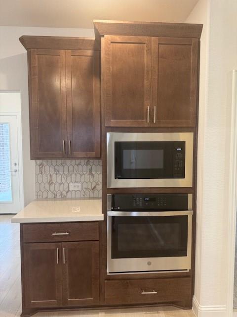 3108 Windecup Road Celina, TX 75009 - Photo 7 of 31 a kitchen with granite countertop cabinets and steel stainless steel appliances