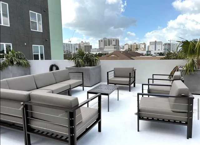 a view of a livingroom with furniture