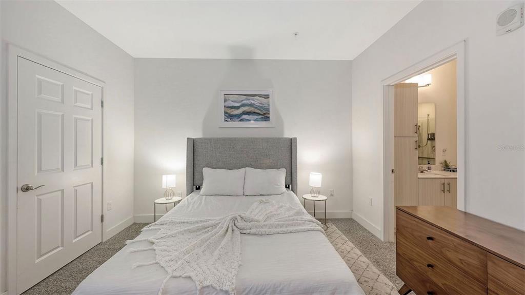 1659 2nd Street, Unit 515 Sarasota, FL 34236 - Photo 3 of 21 a bedroom with a bed and a closet