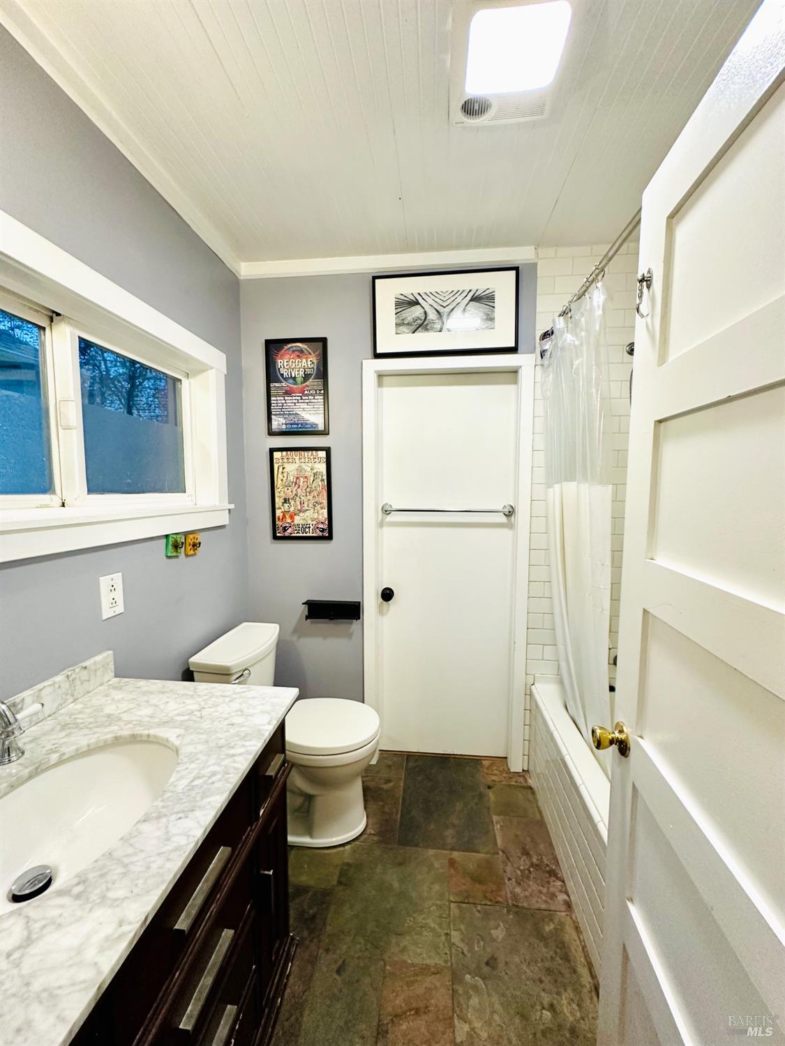 108 Pierson Street Santa Rosa, CA 95401 - Photo 14 of 33 a bathroom with a granite countertop sink toilet and shower
