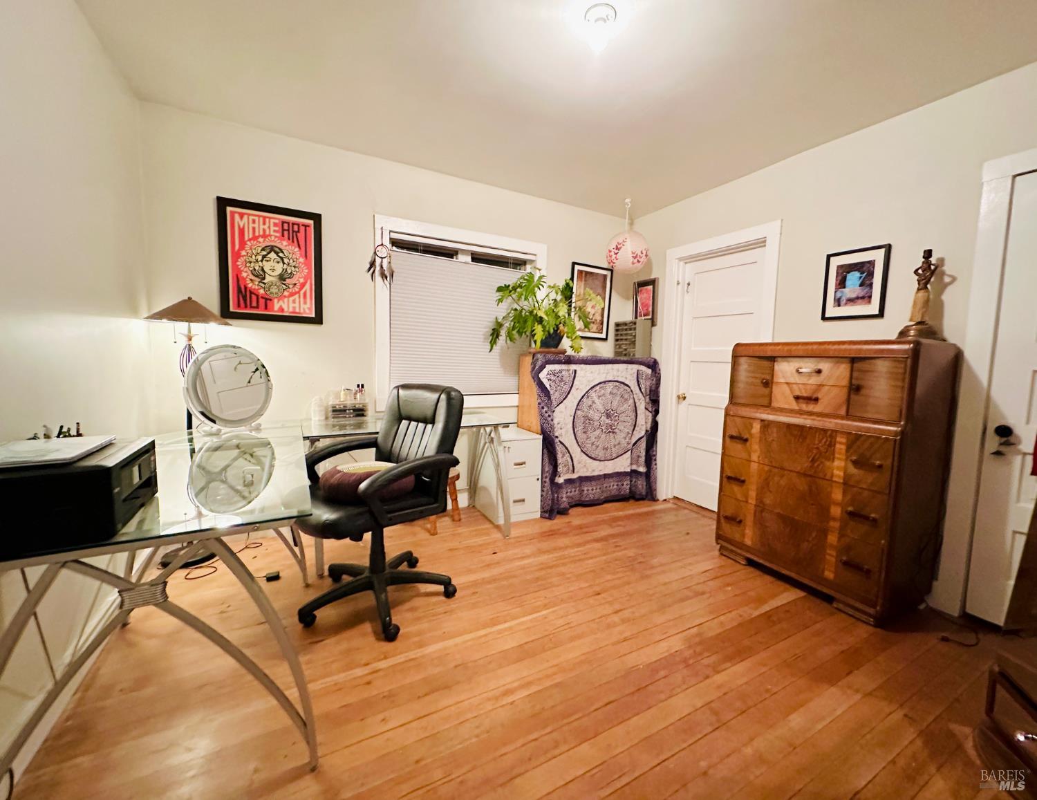 108 Pierson Street Santa Rosa, CA 95401 - Photo 18 of 33 a view of a workspace with furniture and a cycle